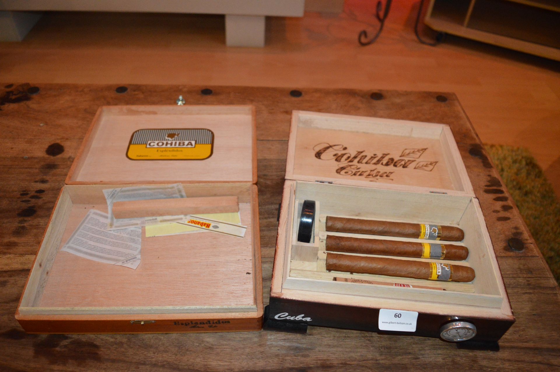 Two Cuban Cigar Boxes and Four Cigars