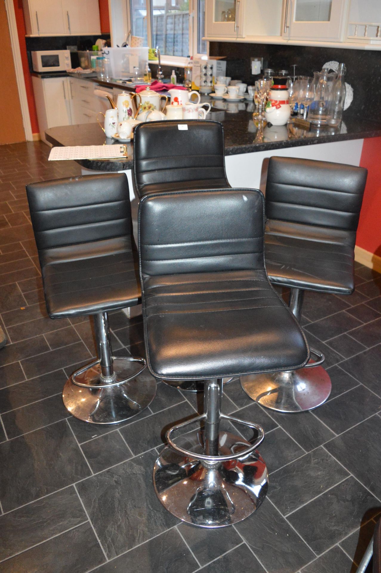 Four Black & Chrome Barstools