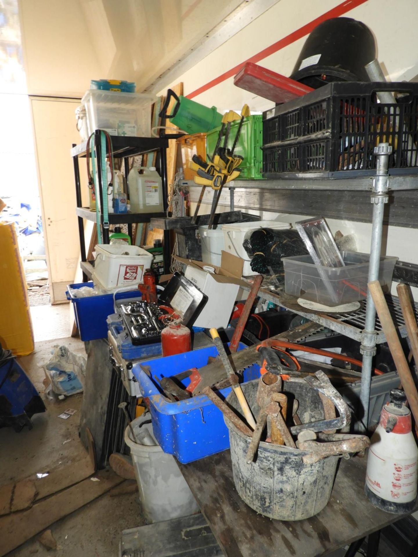 *Workbench and a Shelving Unit with Contents