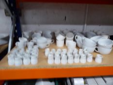 * selection of coffee cups and milk jugs