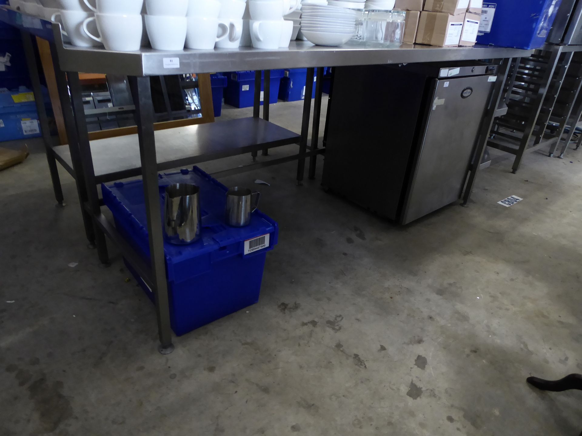 * large stainless steel prep bench, angled corner with three shelves and bonzer tin opener 2800 x