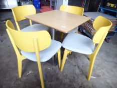 * set of table and 4 chairs yellow wood frame chairs with grey upholstered pads, stainless brushed