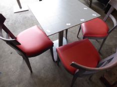 * set of table and 4 chairs, grey wood framed chairs with red upholstered pad, stainless brushed