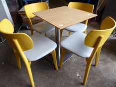 * set of table and 4 chairs yellow wood frame chairs with grey upholstered pads, stainless brushed