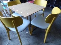 * set of table and 4 chairs yellow wood frame chairs with grey upholstered pads, stainless brushed