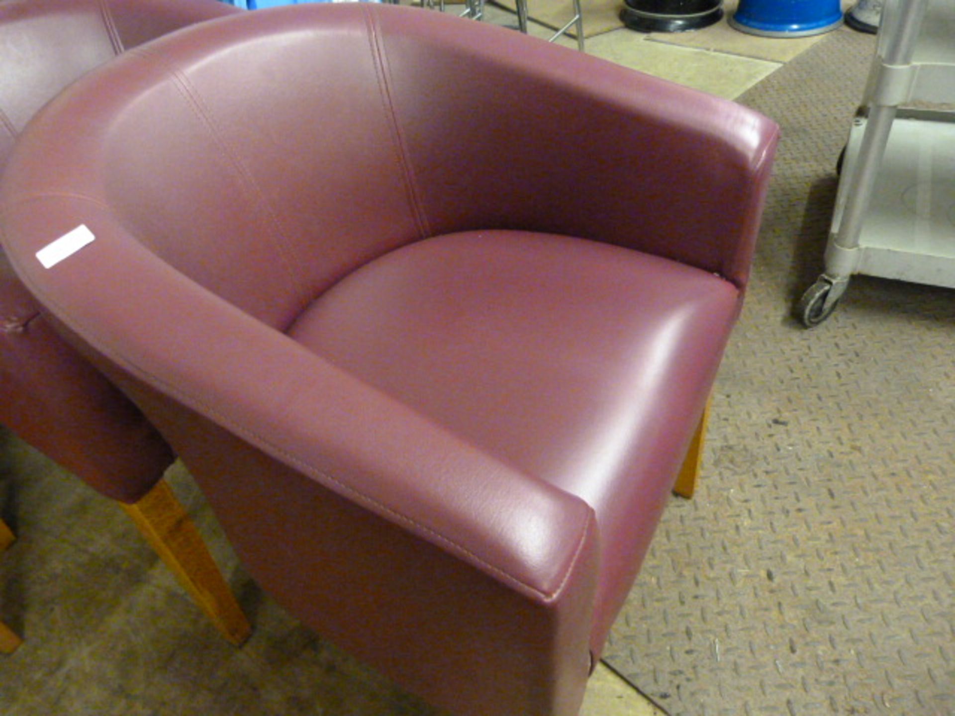 *Two Purple Tub Chairs