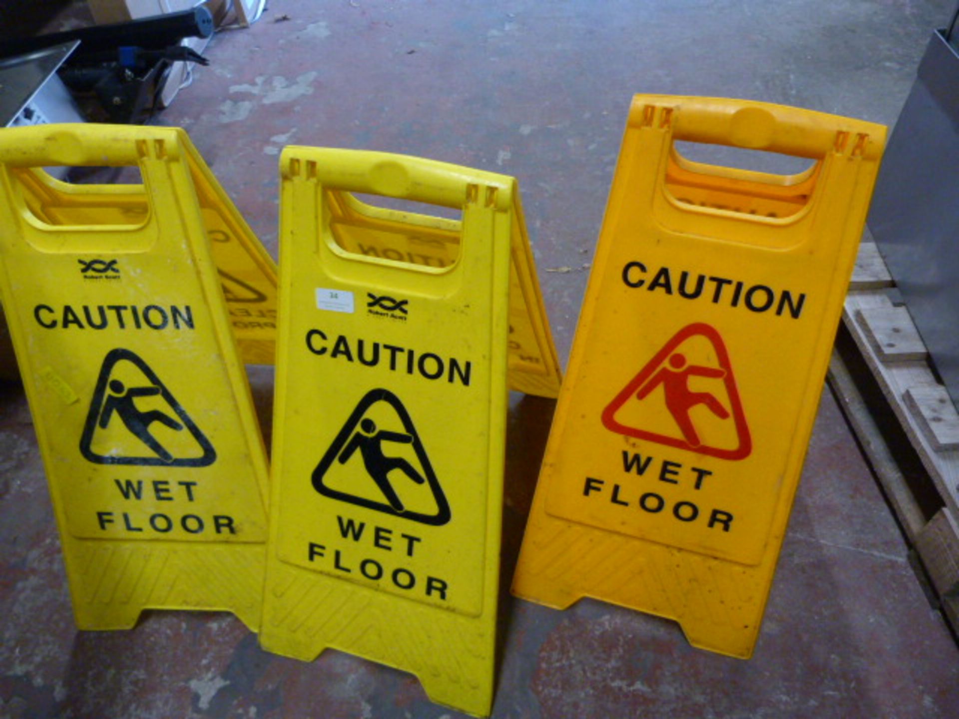 Three Folding Wet Floor Warning Signs