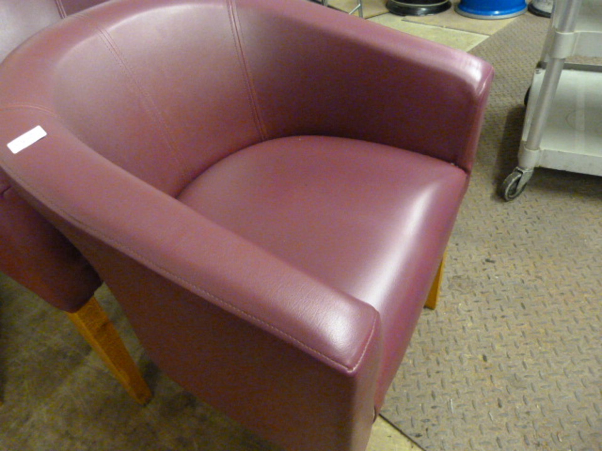 *Two Purple Tub Chairs