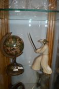 Globe and a Samurai Figurine