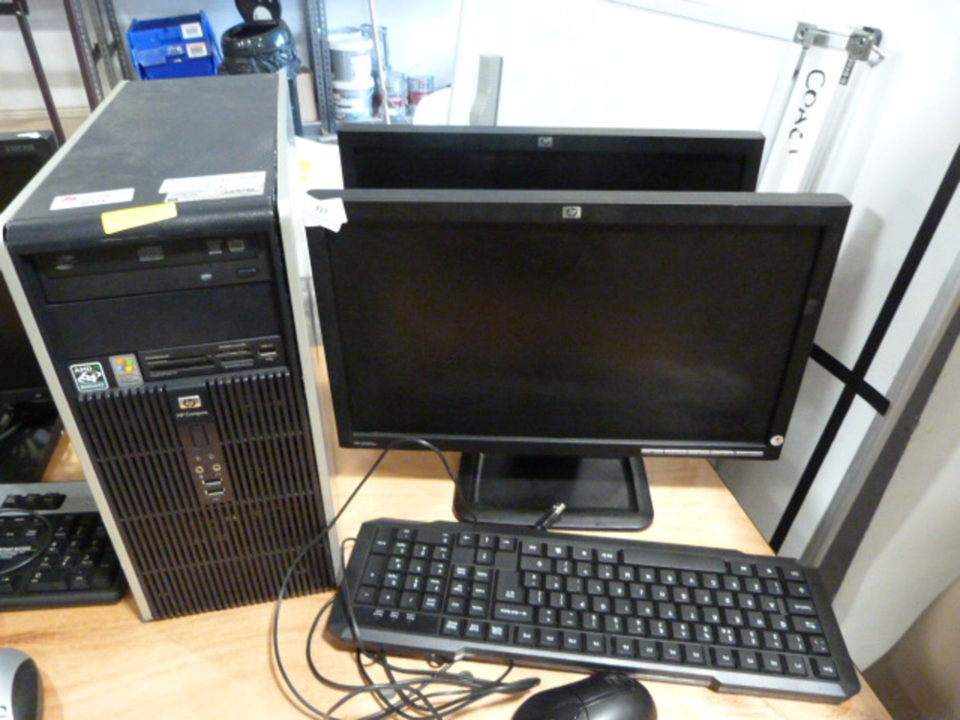 *Two HP Monitors, HP Compaq Tower PC, Keyboard and Mouse