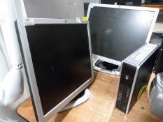 *Two HP Compaq LA1951G Monitors and a HP Computer Tower