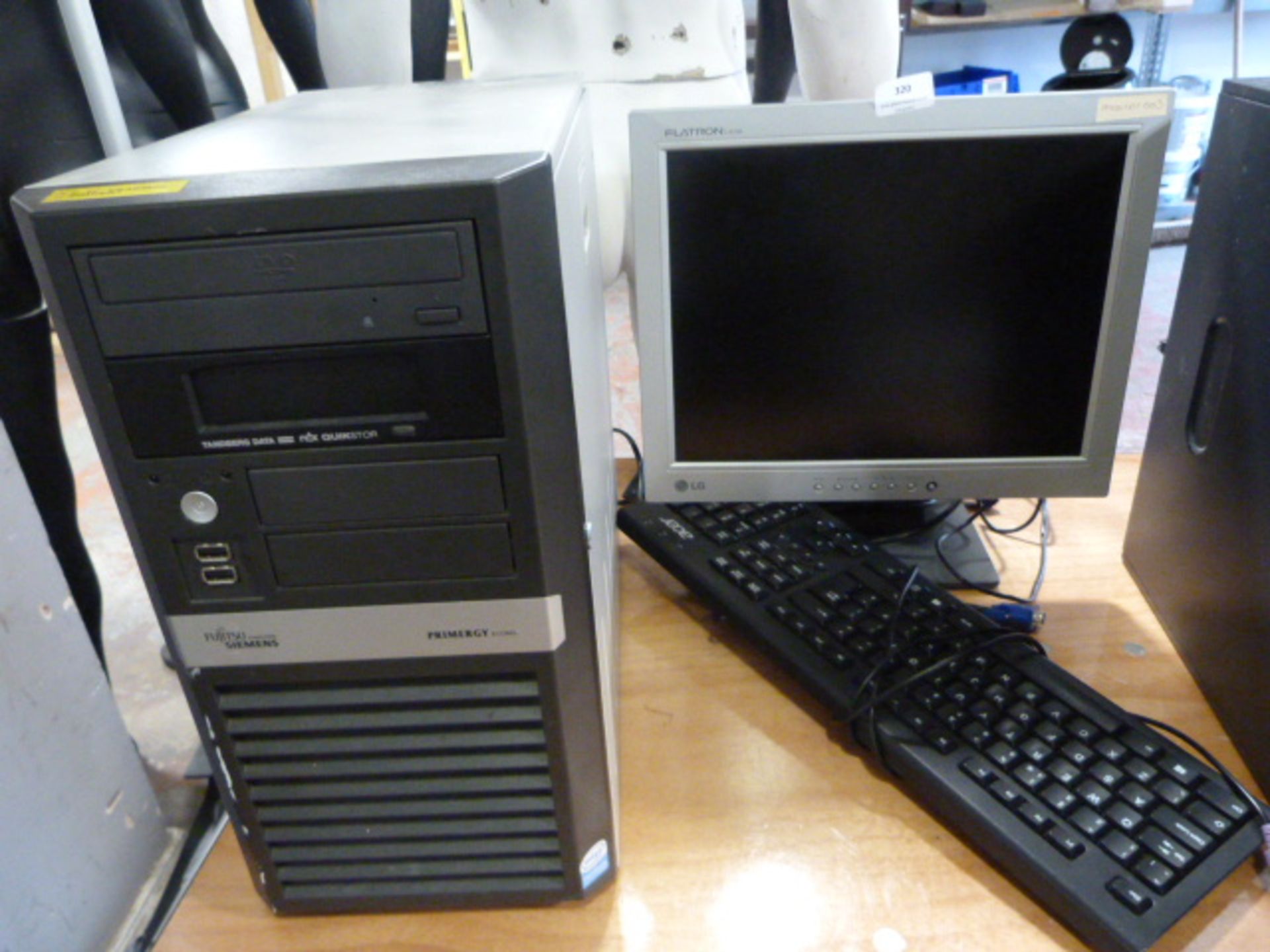 *LG Flatron Monitor, Fujitsu Computer Tower, and Keyboard