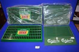 Two Castlemaine XXXX and Two Carlsberg Drip Trays