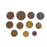 A George III and later trade tokens, comprising C Basker and Son Jewellers and Clothiers, Grantham.,