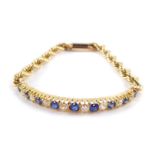 A Victorian sapphire and rose cut diamond set bracelet, claw mounted, with a later rope twist