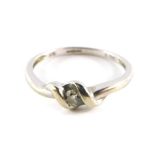 A 9ct gold and diamond ring, in a crossover design, size M, 1.7g all in.