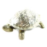 A brass and silver plated clockwork driven bell moulded as a tortoise, by A Barrett and Sons, 63 and