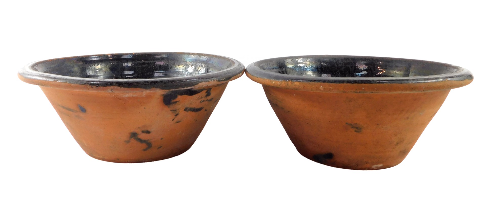 A pair of 19thC brown glazed terracotta dairy bowls, 44.5cm diameter.