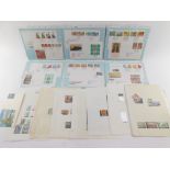 Philately: EII First Day covers, together with Papua New Guinea mint commemorative stamps and a