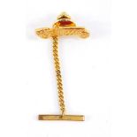 A 9ct gold vintage motor car tie pin, with a yellow metal back and safety pin, pin 1.0g.