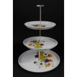 A Barker Bros Royal Tudor Ware ironstone three tier cake stand, decorated in the Springtime pattern,