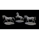 Three Franklin Mint Parian figures of horses, designed by Pamela du Boulay, comprising Extended
