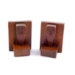A pair of Art Deco oak bookends, carved as owls, 12.5cm high.