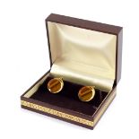 A pair of 9ct gold and tiger's eye cufflinks, 11.3g.