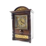 A French early 20thC oak cased mantel clock, square brass dial with foliate spandrels, silver