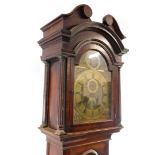 A Georgian oak cased longcase clock by Gamwel of Alford, the brass break arch dial with rococo