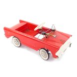 A Tri-ang toy pedal car, red and white chassis, registration LBL4242, with bell and horn, 86cm