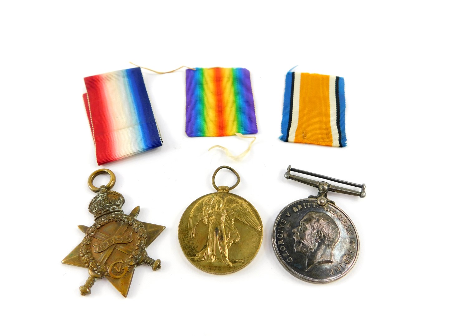 Three Great War medals, named to private Percy Judd, first Bn. Wiltshire Regiment, service no.