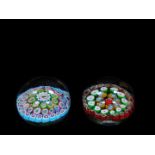 Two glass concentric Millefiori paperweights, 8cm diameter.