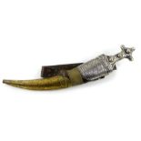 An Indo Persian 19thC Jambaya dagger, the horn grip with silver engraved and embossed mounts,