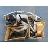 Assorted car parts, to include an exhaust pipe, lights and wing mirrors, engine parts, and a retro