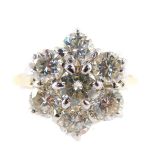 An 18ct gold and diamond seven stone flower head cluster ring, approx 2.0 carats in total