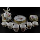 A group of Dresden porcelain tea and coffee wares, painted with sprays of flowers, gilt