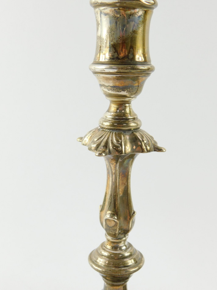 A pair of George III loaded silver candlesticks, of turned form with embossed scroll decoration, - Image 3 of 7