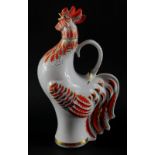 A Lomonsov porcelain vodka decanter modelled as a cockerel, printed mark, 26.5cm high.