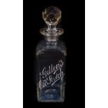 An early 20thC cut glass advertising decanter for Gillon's Old Scotch, gold medal, John Gillon &