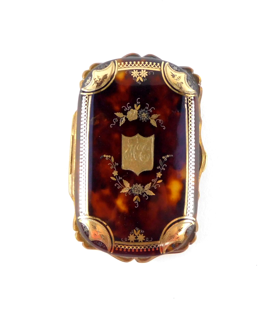 A Victorian tortoiseshell purse, with gold and silver pique decoration, decorated centrally with a