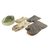 A pair of USAAF WWII flying gauntlets, type A-9, a pair of Vietnam era M1950 cattle hide gloves, and
