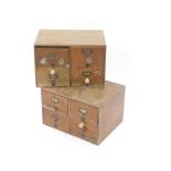 A pair of early 20thC oak index card chests, each of four drawers, 31.5cm high, 47.5cm wide, 35cm