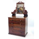 A Victorian mahogany chest, of four long graduated drawers raised on a plinth base with later