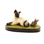 A Beswick pottery figure modelled as a "Watchit", with a Siamese cat and mouse, on an oval base, no.