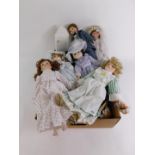 Assorted collectors dolls, dressed in Victorian costume, with stands. (a quantity)