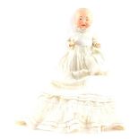 A Hertel Schwab and Co bisque head doll, circa 1911, modelled with open mouth, no. 159-1 ½, clothed,