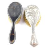 A George V silver and tortoiseshell hair brush, with pique decoration, Birmingham 1910, and a