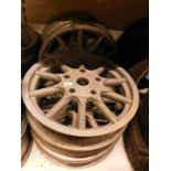 Six unnamed alloy wheels, ten spoke, 19" diameter.