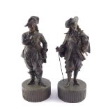 A pair of late 19thC spelter figures, modelled as King Charles I and Oliver Cromwell, raised on